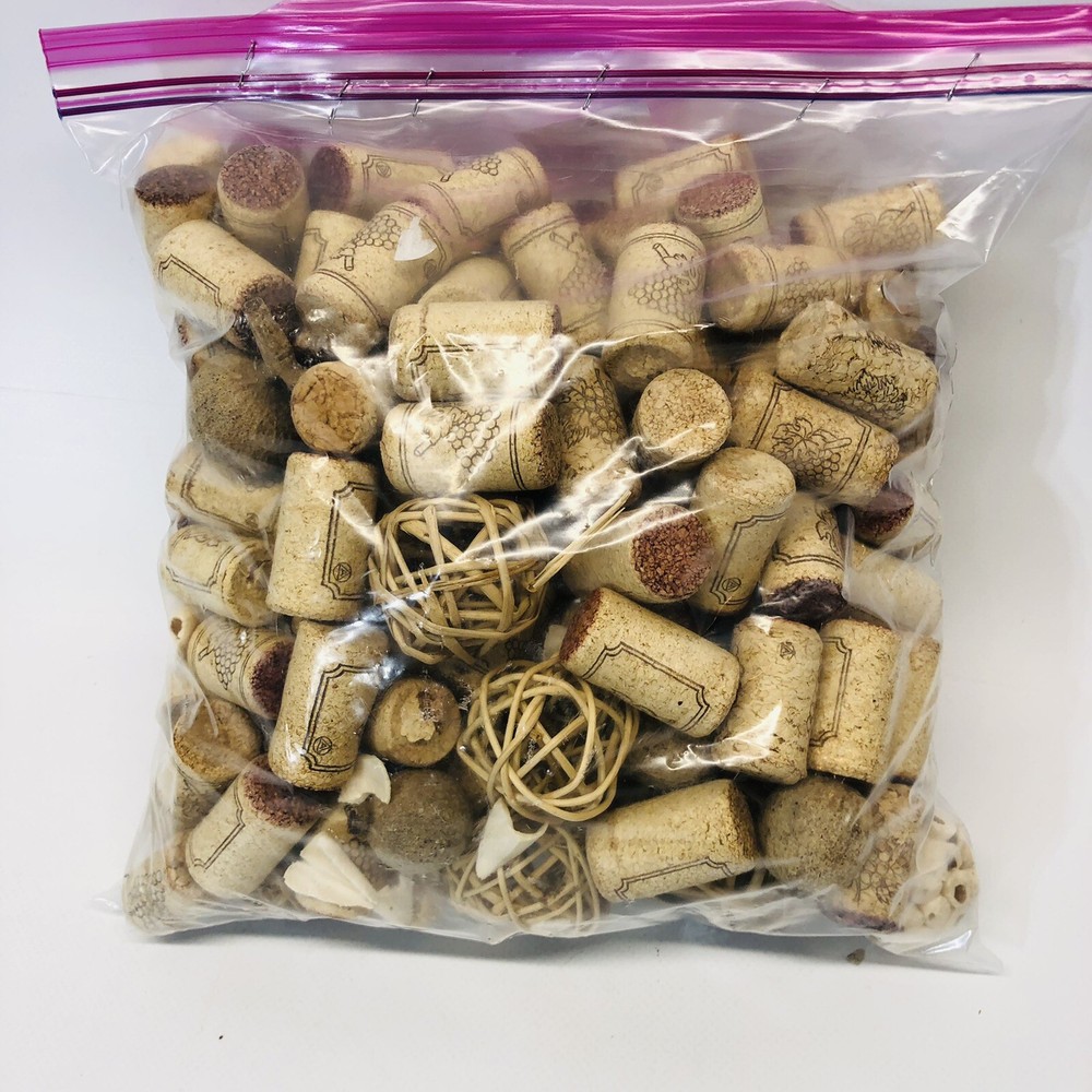 Gallon size bag 144 Used Wine Corks And Other Items.