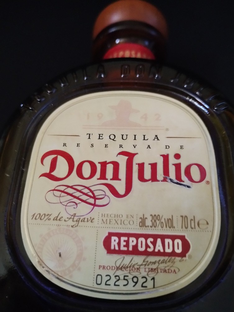 Empty DonJulio tequila bottle 70cl with stopper.