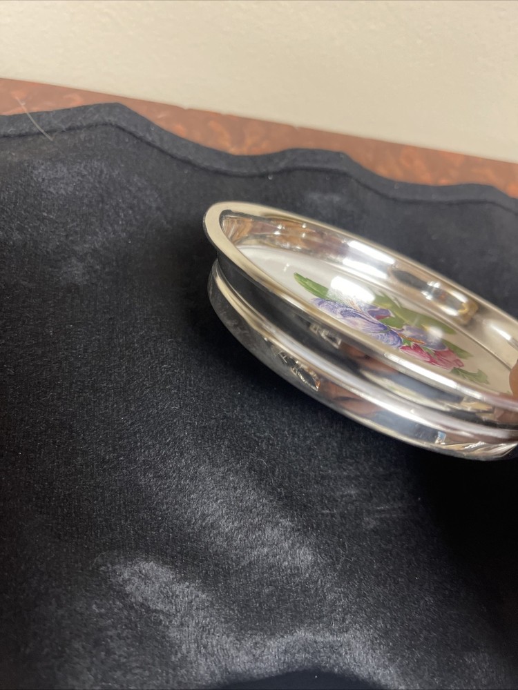 Rogers silver Company coasters with floral display