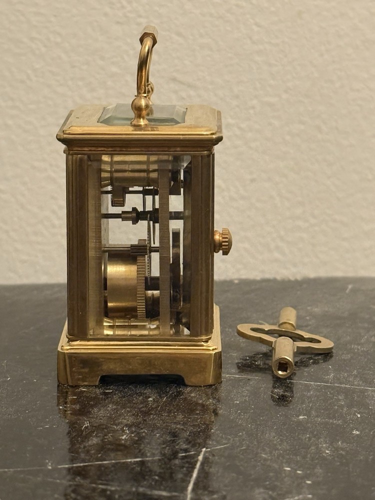 Bronze miniature carriage clock with a silver plated front