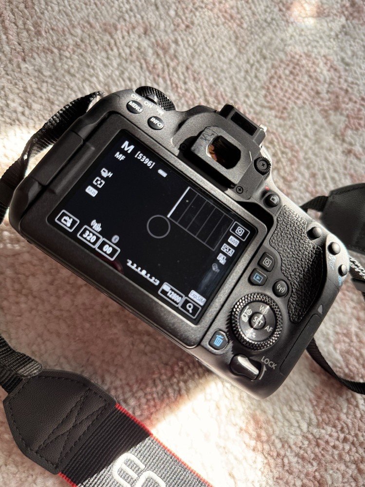 Canon EOS 77D Camera Accessory Bundle with EFS 18-55mm Lens, Strap, Charger