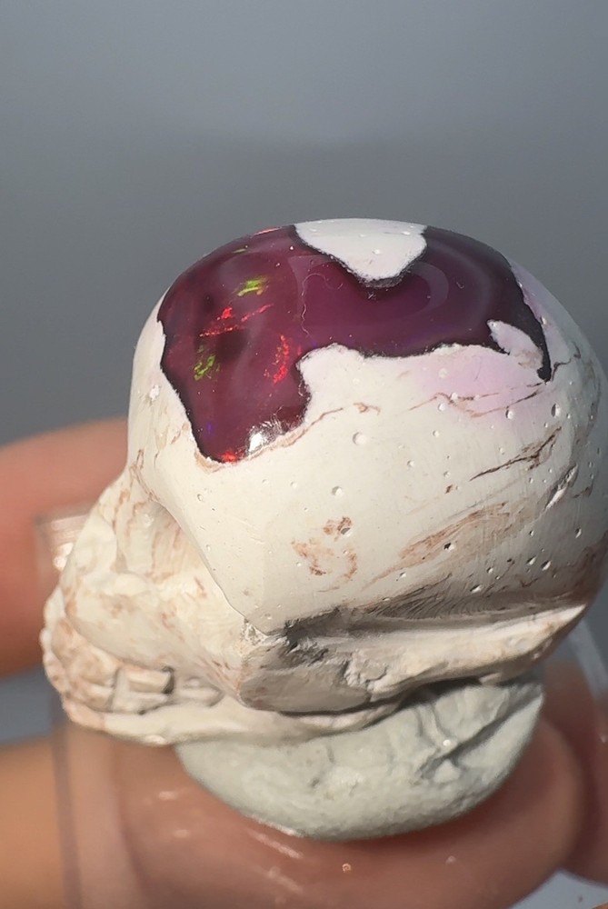 Mexican Fire Opal Carved into Hauntingly Beautiful Skull
