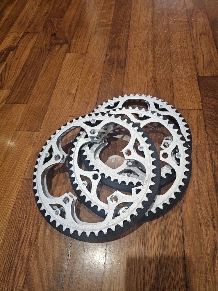 Brompton 50T bicycle chainrings and chain guards.
