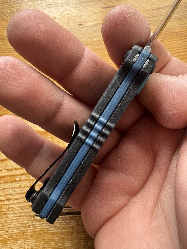 Kershaw Kapsule Manual Open Sliding Button Lock Single Edge Spear Point Blade