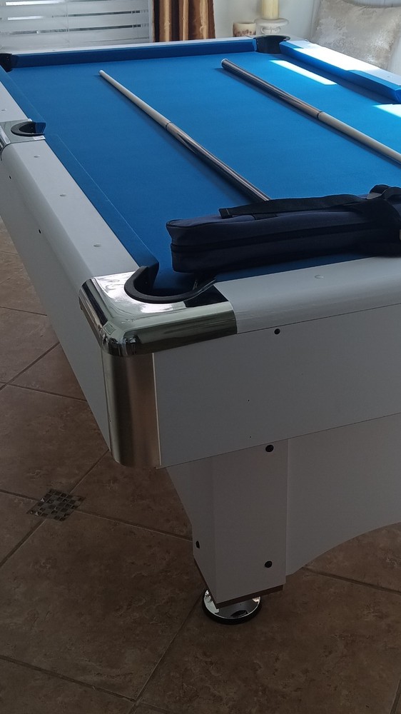 White Billiard Table with Blue Felt and Cues
