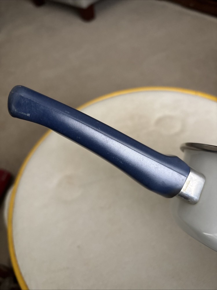Vintage White Enamel Saucepan With Blue Handle
