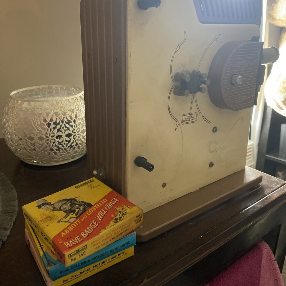 Brumberger 8mm Projector Model 1500- With 3 Films