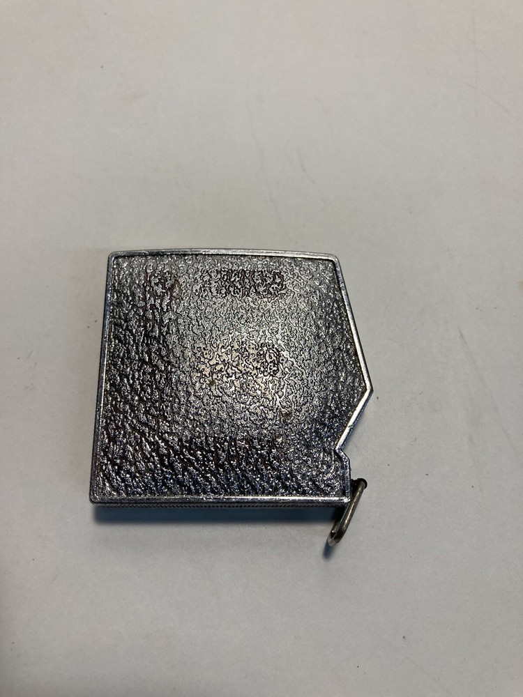 Antique Hendrix Co. Tape Measure