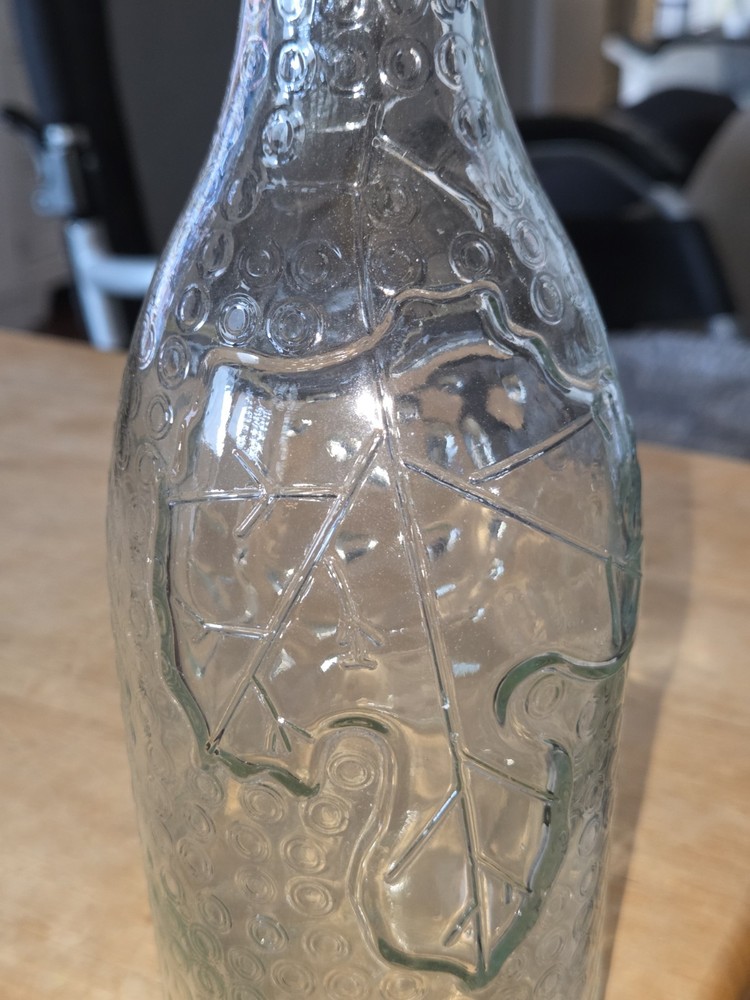 Decorative Clear Glass Bottle with Embossed Leaf Pattern