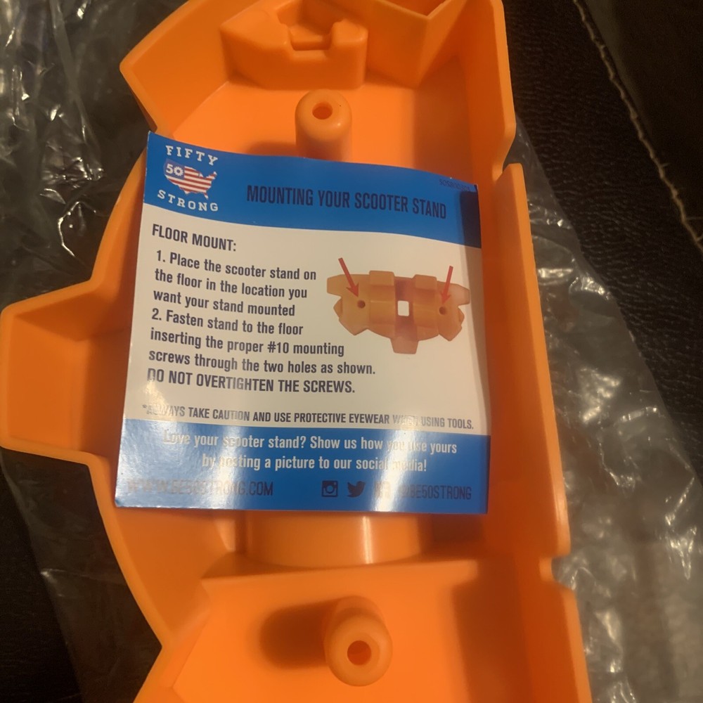 Orange Kids Scooter Stand: Front Wheel in & Scooters Don’t Fall (NEW)