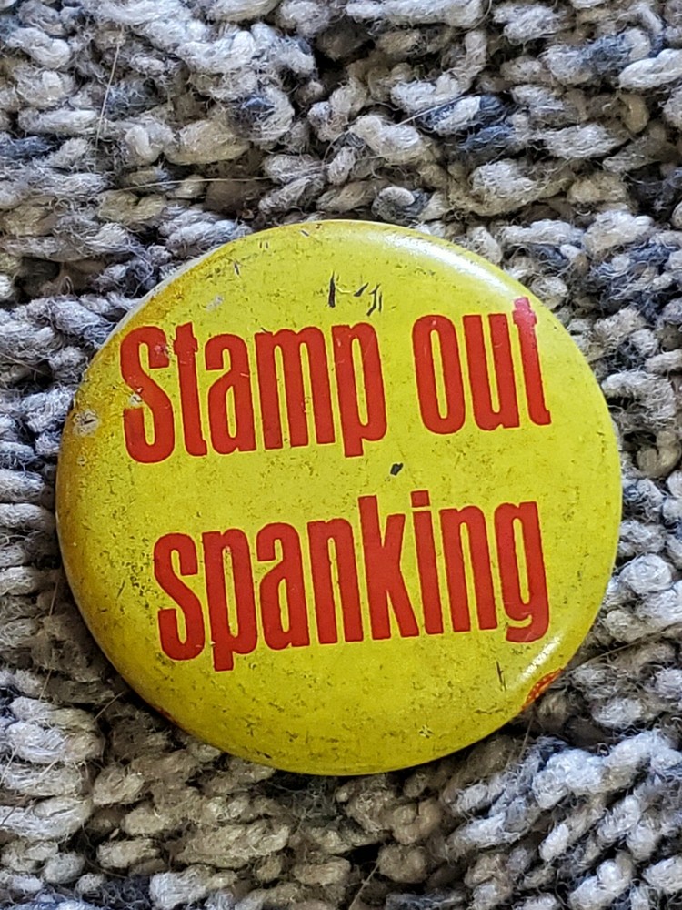 VINTAGE STAMP OUT SPANKING PINBACK PIN BUTTON
