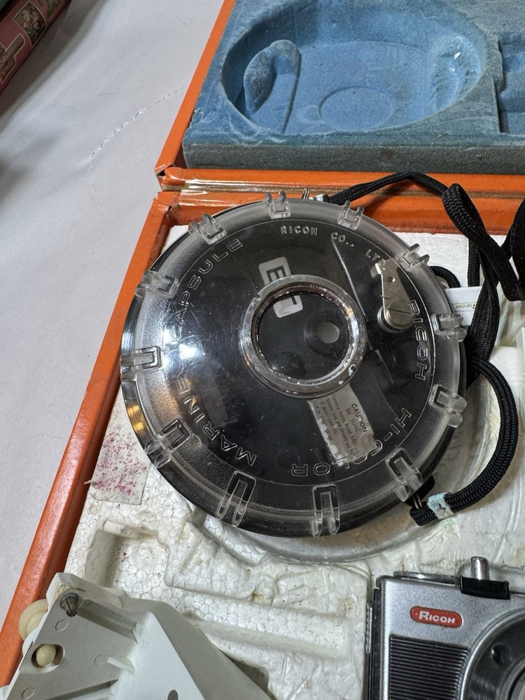Ricoh 35 with underwater housing package