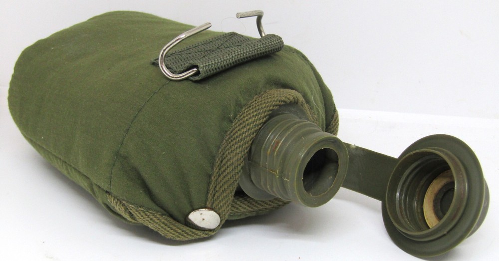 8" Green Plastic Canteen with Cloth Cover.