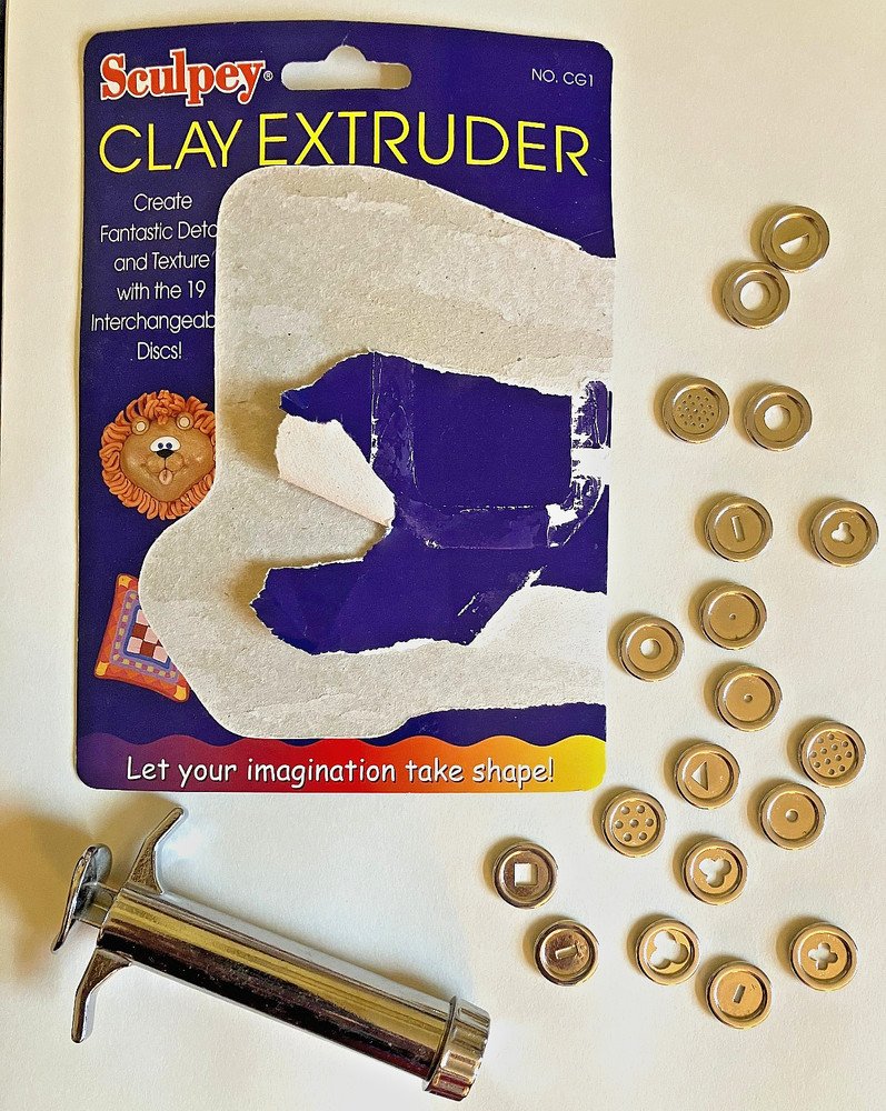 Sculpey polymer clay extruder - pre-owned, lightly used, includes 19 discs