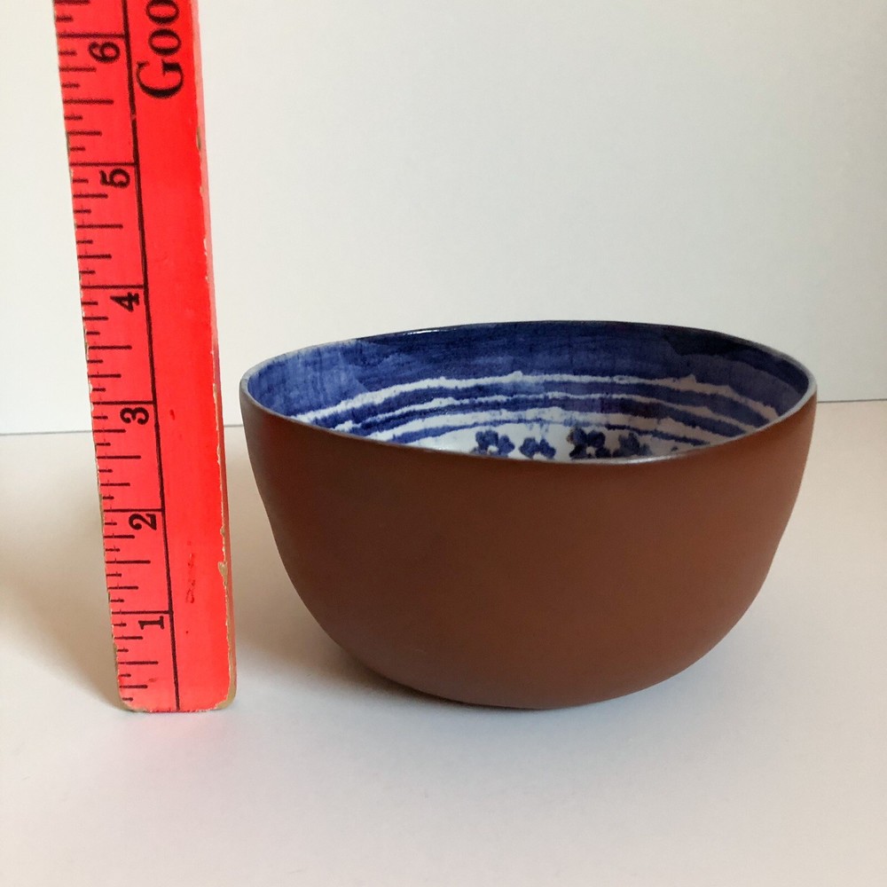 Signed Capuchin style bowl w/ glossy floral interior