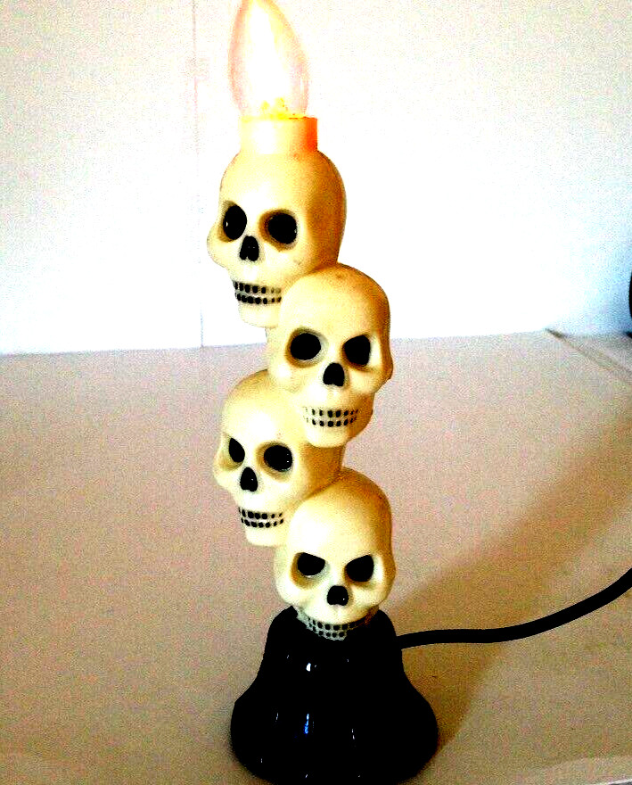 Vtg. Plastic Flickering Lighted Stacked Skeleton Skulls Window Decor 9"