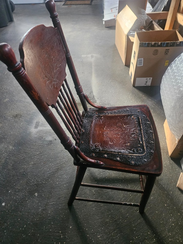 Antique Chair with tooled Leather