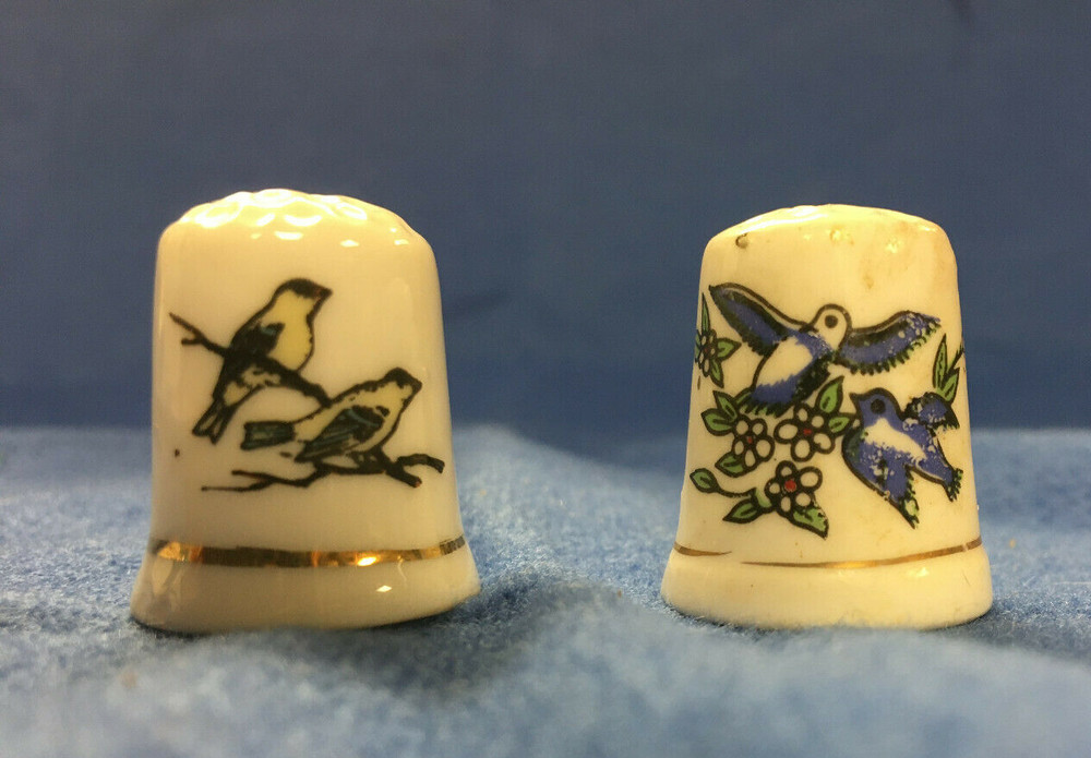 Thimbles Porelain set of 2 With birds painted on them