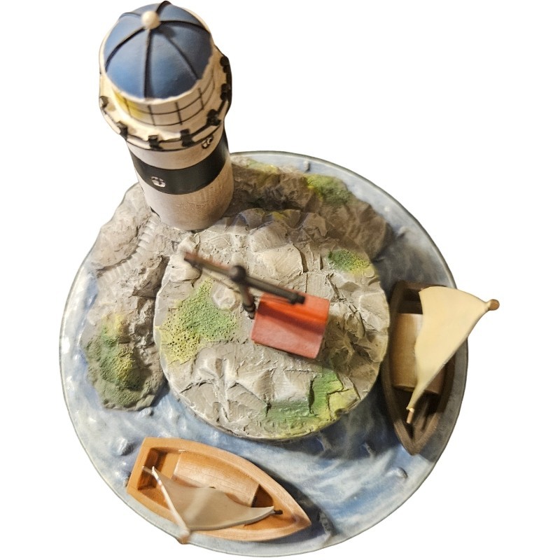 vintage nautical-themed ceramic candle topper