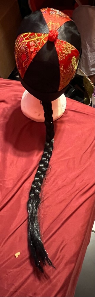 Oriental costume hat with long black braid