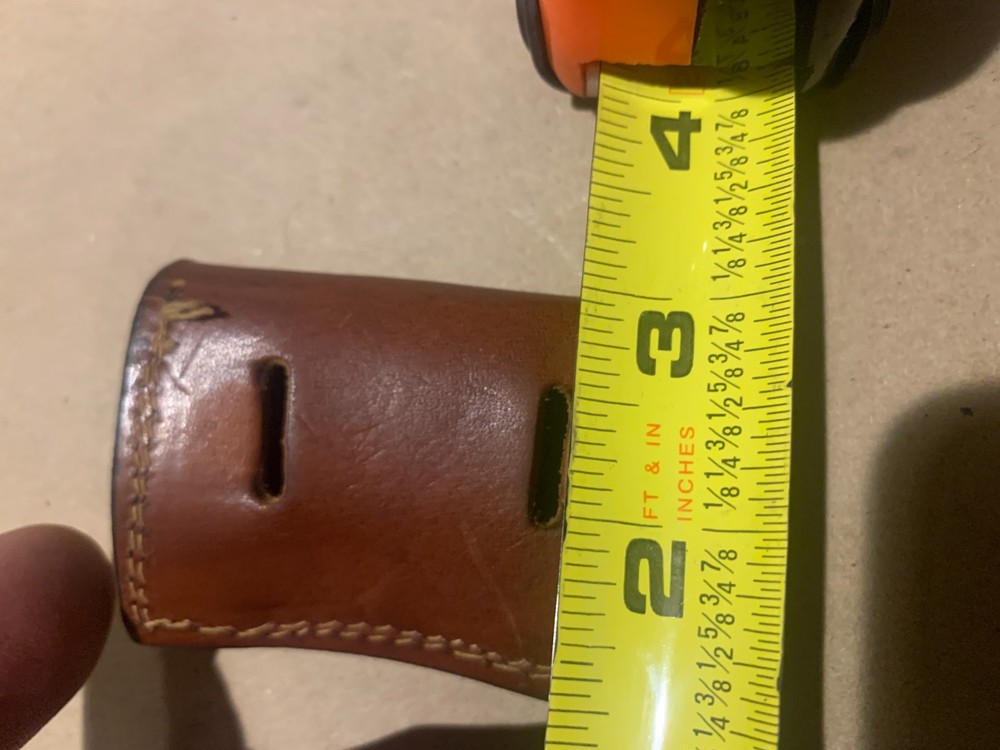 Tiny Leather Pouch for Gun/Camera/Binocular Accessory??