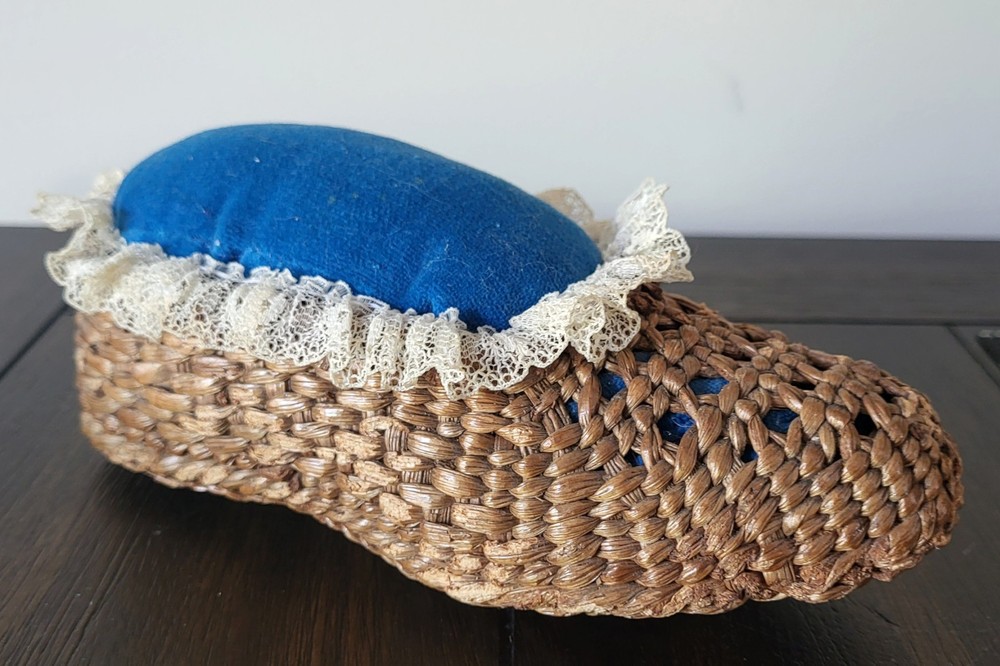 VINTAGE WOVEN WICKER PIN CUSHION.