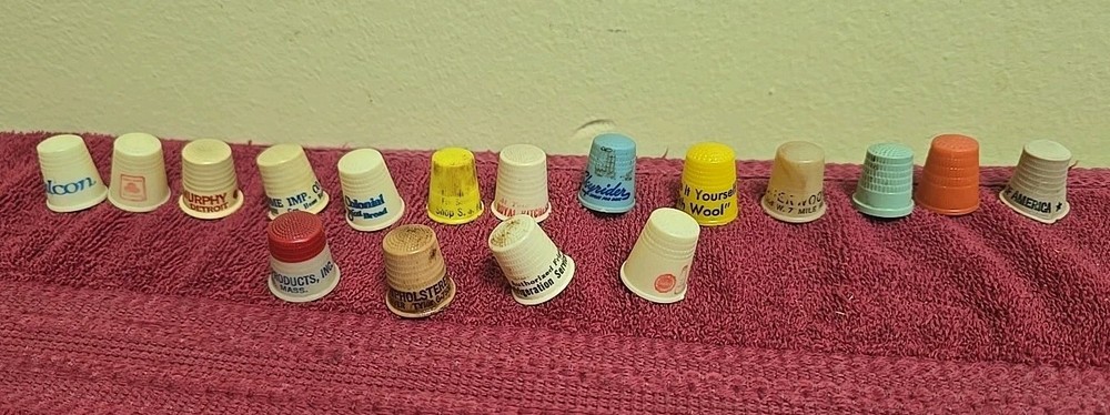 17 Plastic Thimbles 15 Have Advertising On Them