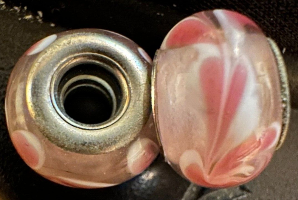 two matching pink patterned charms  For Charm Braeclets