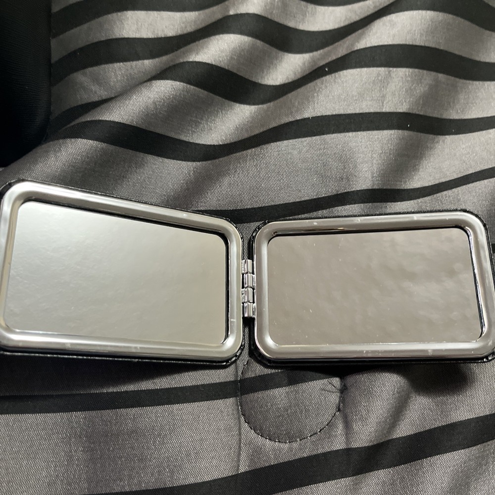 Black Mirror Fits In Purse