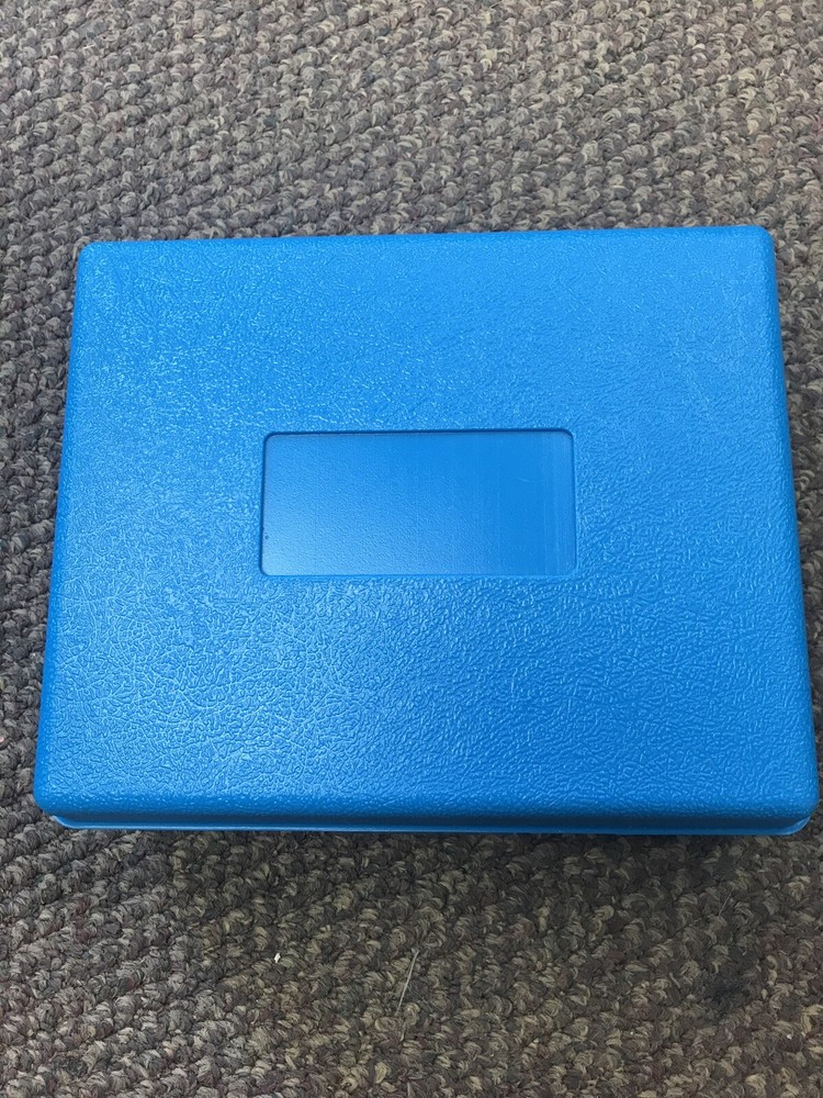 small plastic storage case 6”by 7” By 2” High