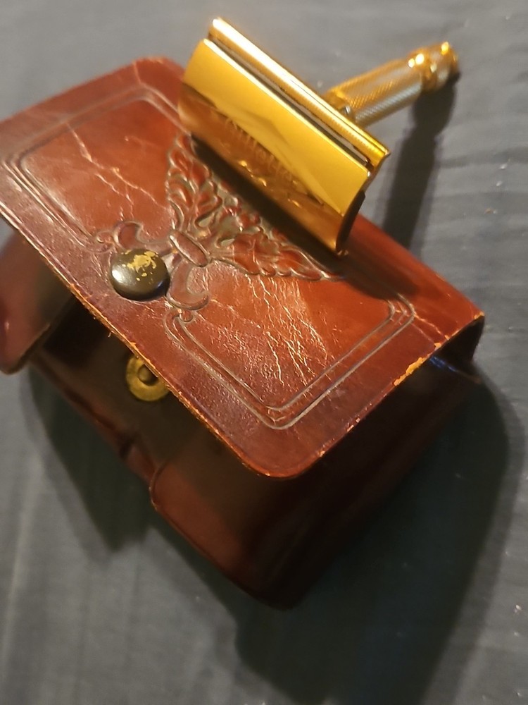 Vintage Gillette brass razor with leather case