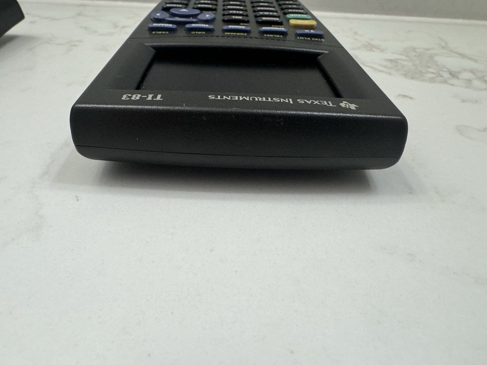 Texas Instruments TI-83 Handheld Graphing Calculator