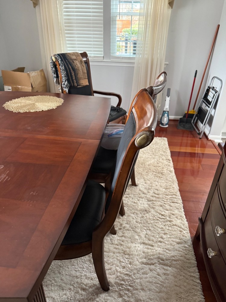 dining table wood with leaf , cherry wood a few scratches .