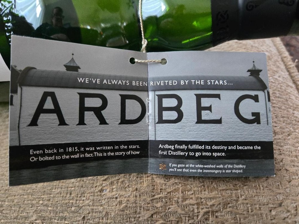 Ardbeg Supernova 2009 empty bottle and brochure