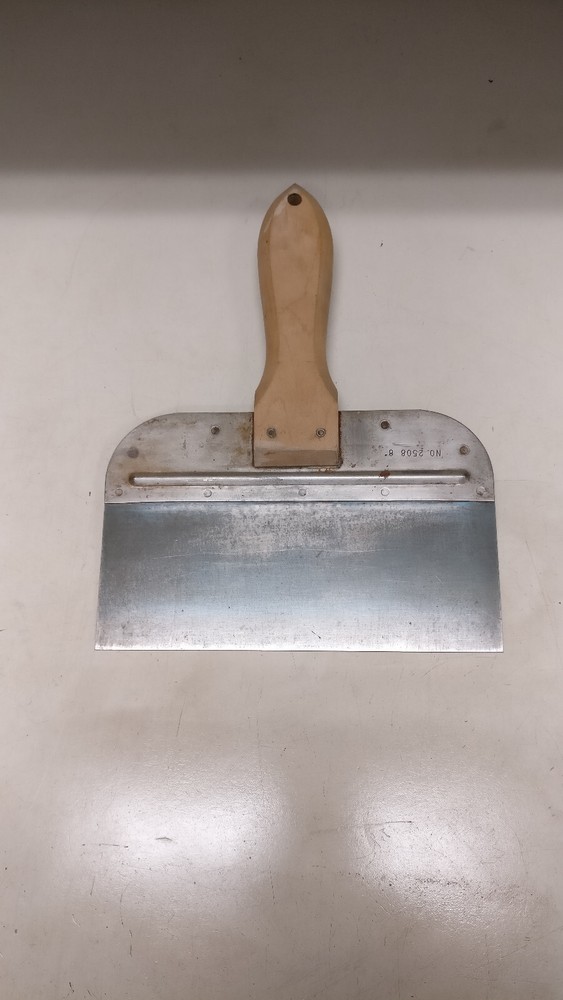 Eight assorted drywall/mud tools