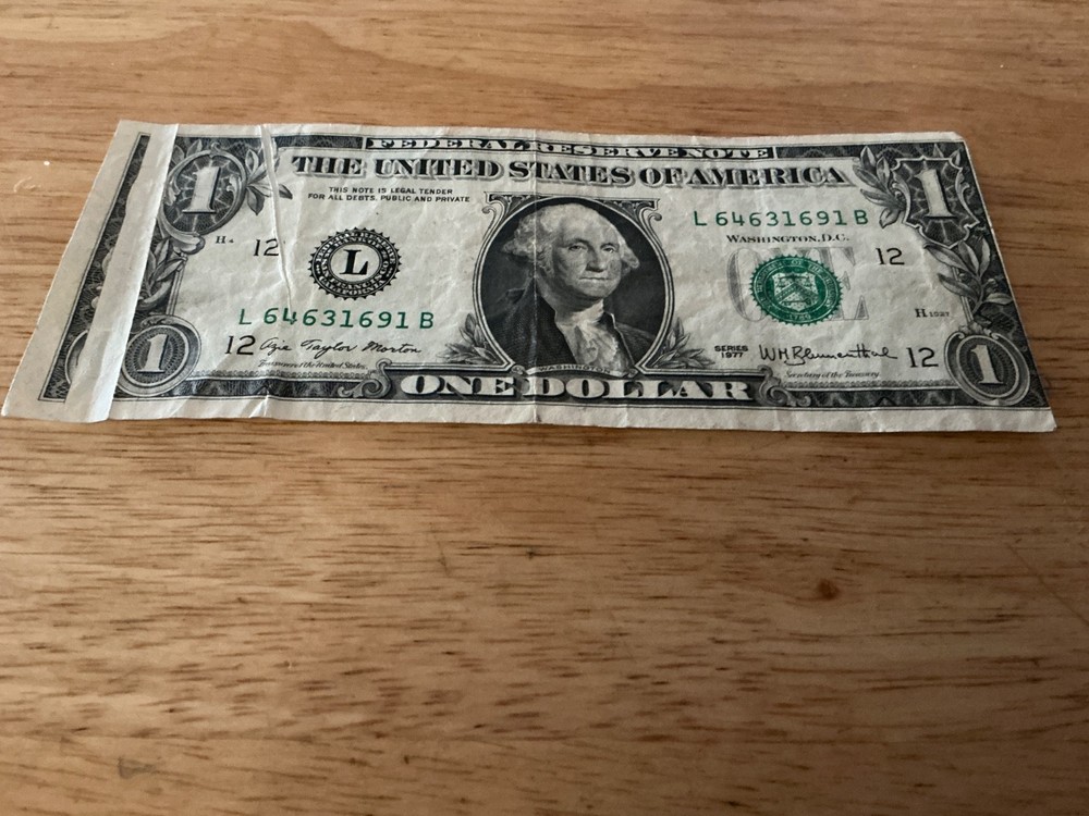 $1 1977 L series "DOUBLE GUTTER FOLD, misaligned errors. RARE