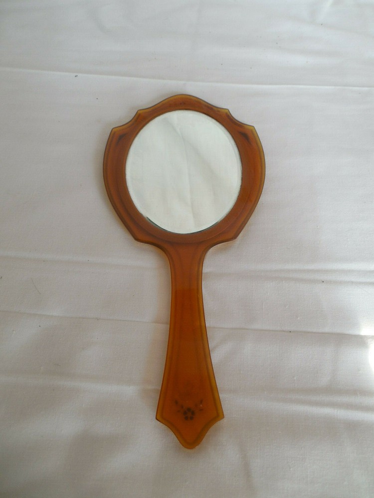 Vintage large bakelite hand mirror