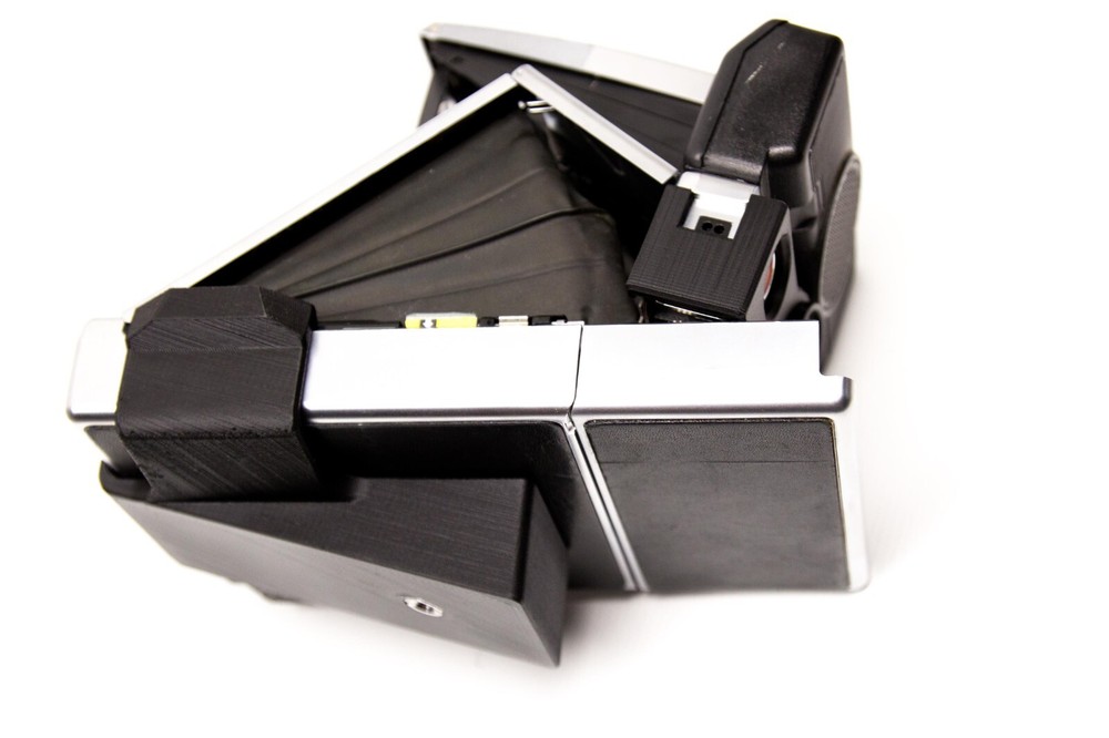 Tripod mount for Polaroid SX-70 Instant camera