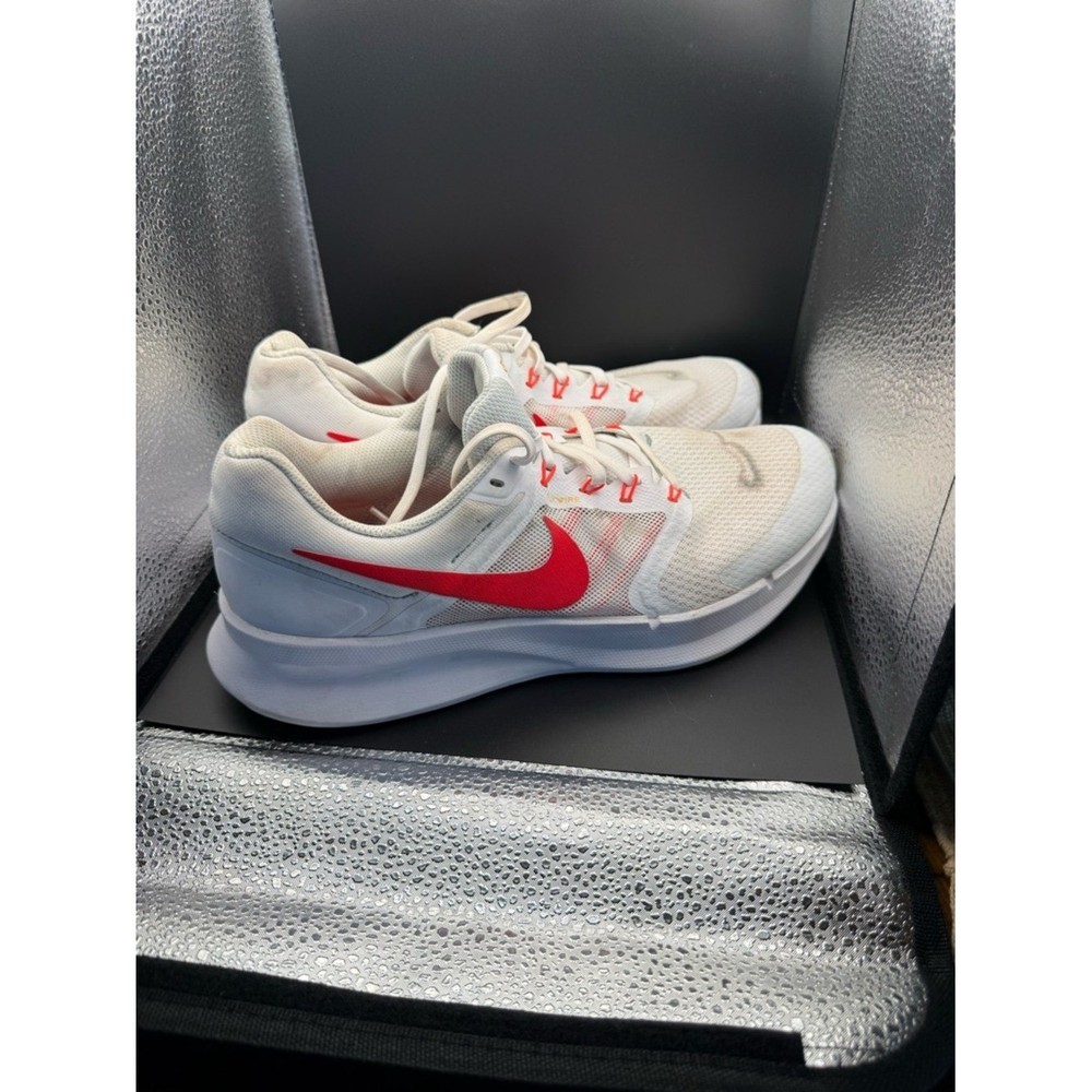 Nike White Athletic Shoes with Red Swoosh