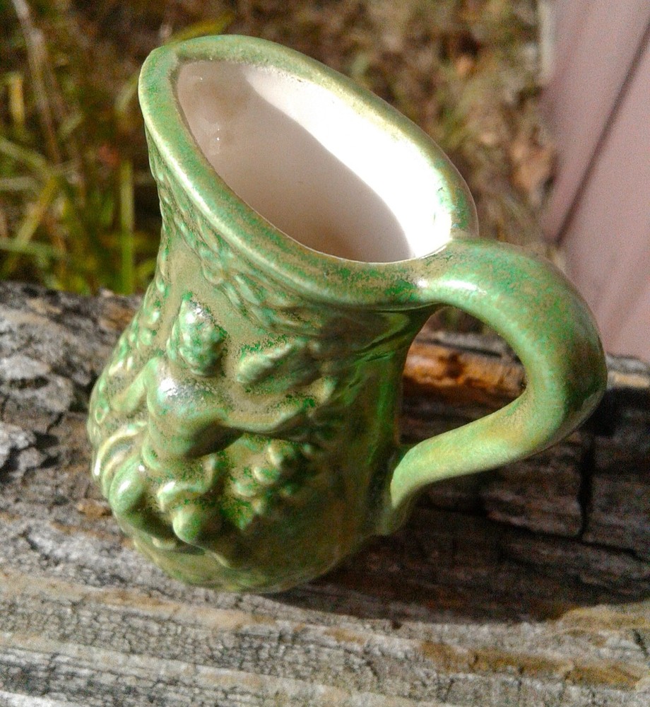 Vintage Miniature Green Pitcher with Embossed Cherubs