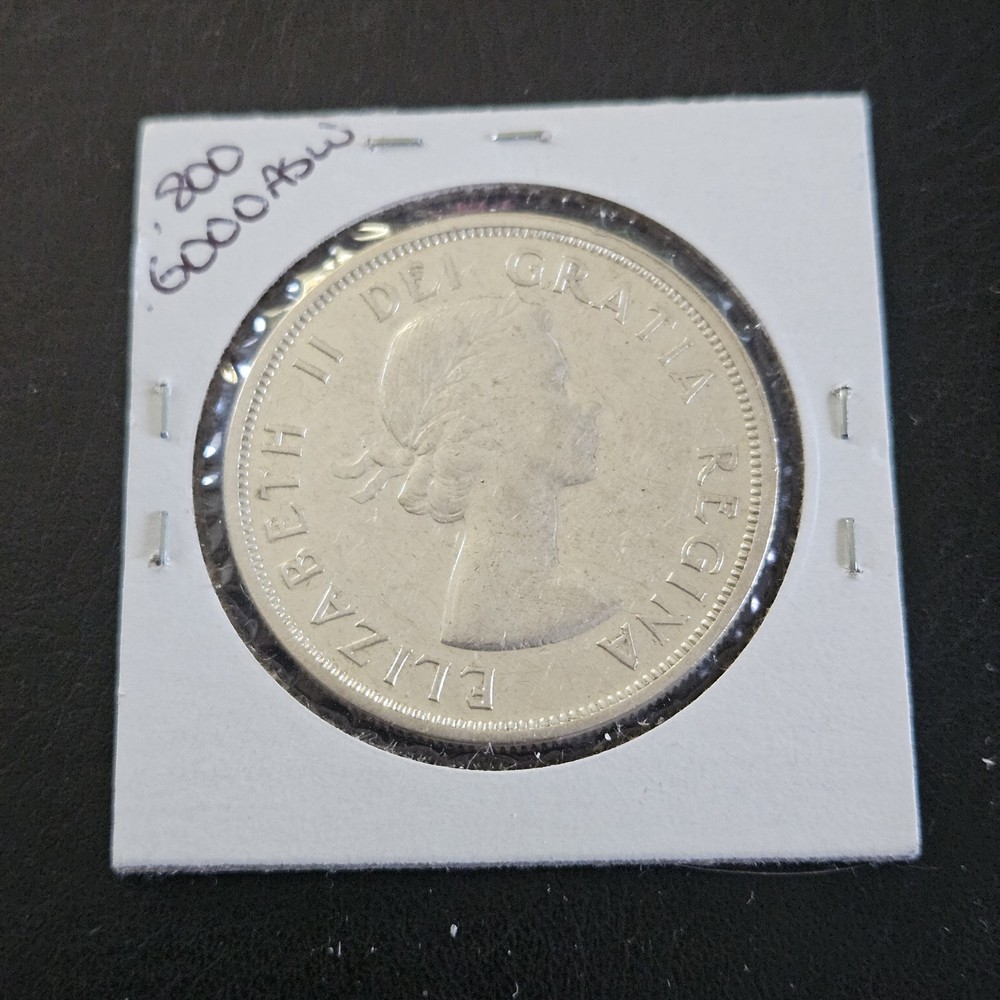 1963 Canada Silver Dollar. 80%. Elizabeth II. CANAH
