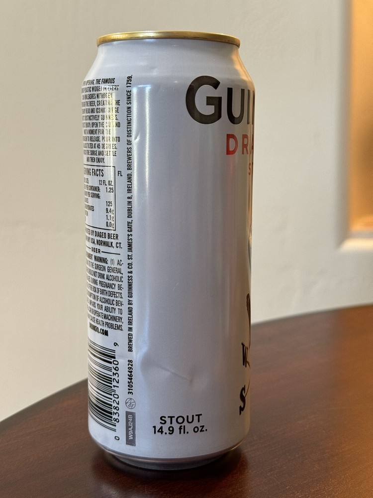 Guinness Draught Stout - Toucan on weather vane - Empty Beer Can Bottom Opened