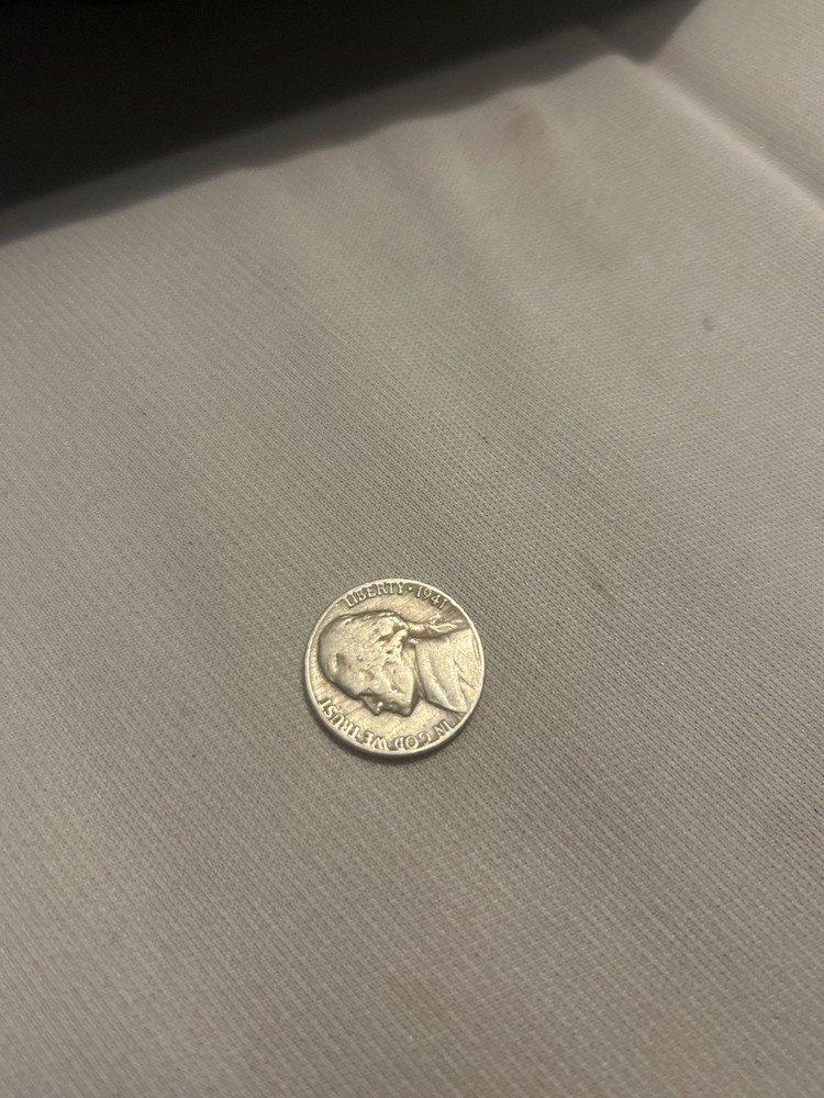 1941 Nickel No mint mark with rim error.