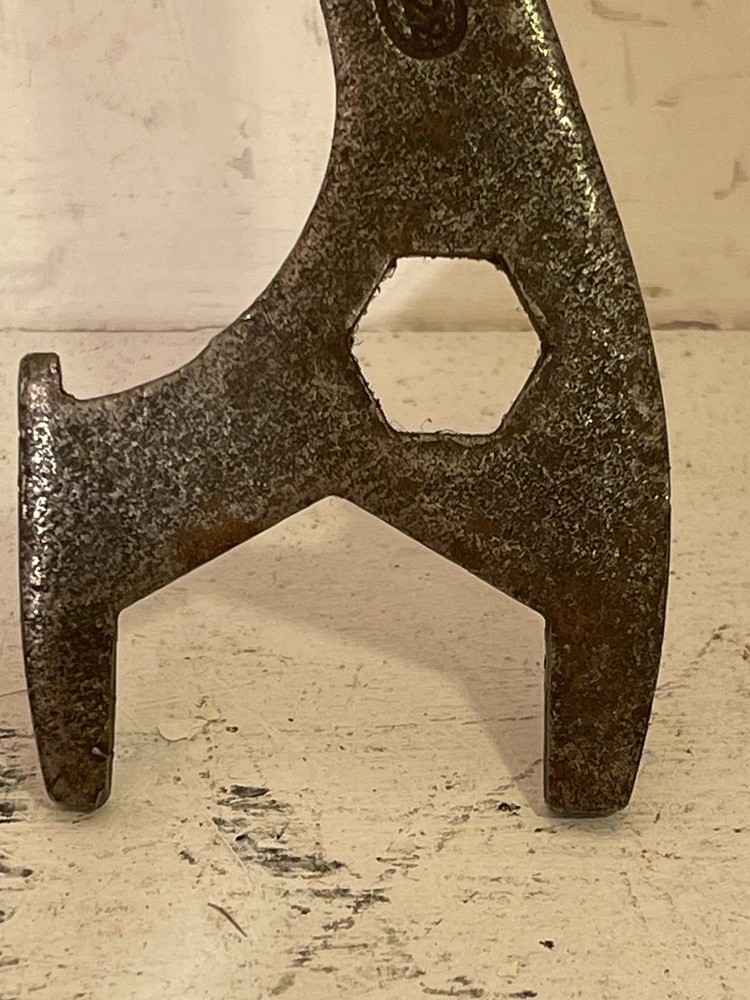 A vintage British mullti-use bicycle spanner