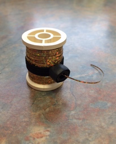 1 FLY TYING SPOOL HAND. keep your tinsel, floss or material from unspooling.