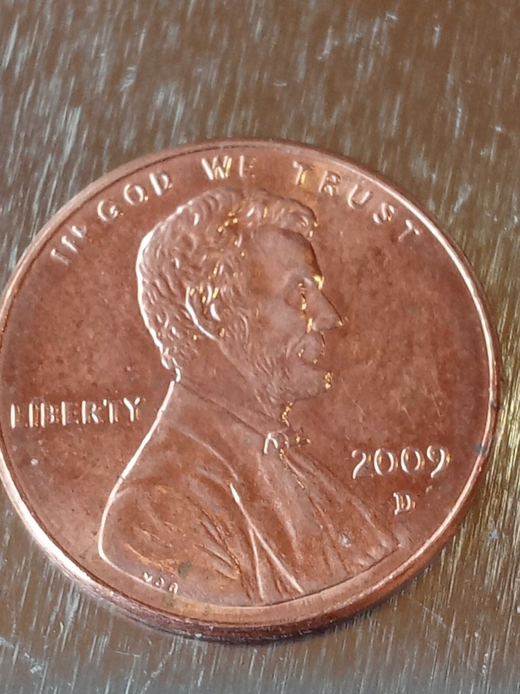 2009 D Linc Bi comm cent Red Formative yrs bronze beauty
