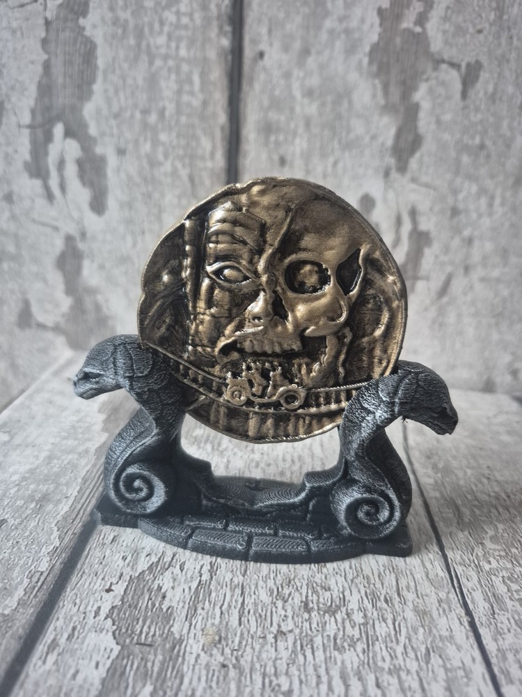 Indiana Jones Maraglyph Decoder Coin and stand