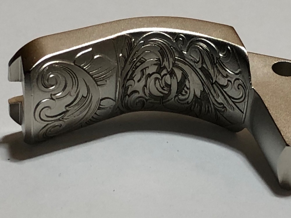 1911 GI Style Grip Safety - NEW satin nickel deep laser engraved scroll pattern
