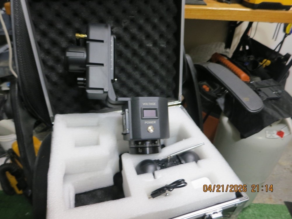 Remote control pan/tilt for camera light scopes