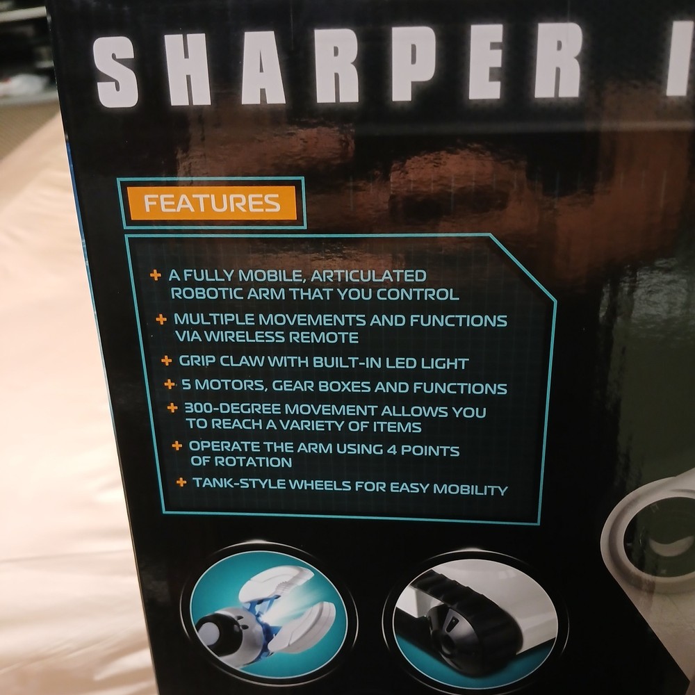 Sharper Image Remote Control Robotic Arm with Spotlight Claw Tank Tread Wheels